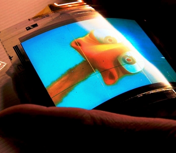 A new manufacturing process developed at the Flexible Display Center at Arizona State University promises to provide an effective method for mass production of flexible electronic devices capable of displaying full-color, full–motion video