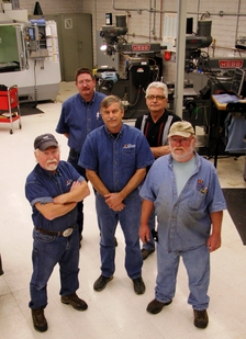  The machinists of the Engineering Technical Services Instrument and Prototype Machine Shop: (back row from left) Dave Mushier and Dennis Golabiewski; (front row from left) Dave Gillespie, Marty Johnson and Ben Schwatken. Photo: Pete Zrioka/ASU
