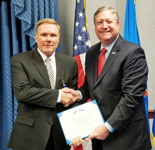 Werner Dahm (left) receives the U.S. Air Force's Decoration for Exceptional Civilian Service from Secretary of the Air Force Michael B. Donley at the Pentagon.