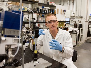 Doctoral student Mac Gifford is conducting water research, exploring the possibilities of various materials that, when applied at the nanoscale, are capable of removing contaminants. Photographer: Jessica Hochreiter/ASU.