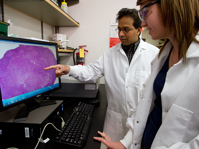 Vikram Kodibagkar (left), an assistant professor in ASU's School of Biological and Health Systems Engineering, is the recipient of a National Science Foundation CAREER award for his work to more precisely reveal the condition of body tissues, specifically tissue oxygen levels. Photo by: Jessica Hochreiter/ASU