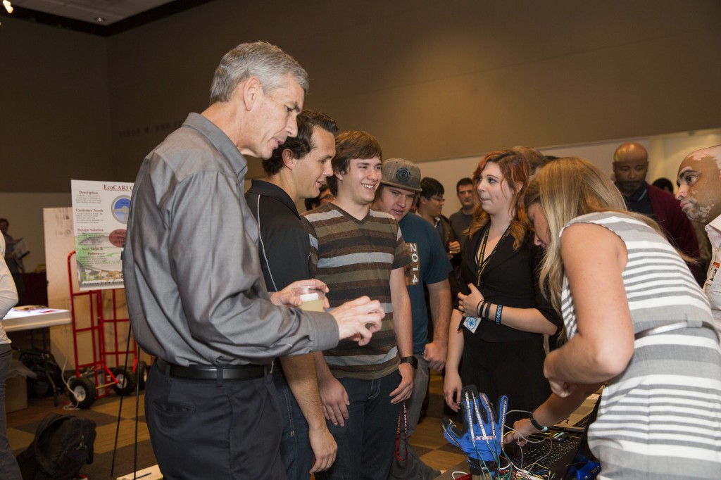 Fulton Schools Dean Paul Johnson speaks with students at Innovation Showcase