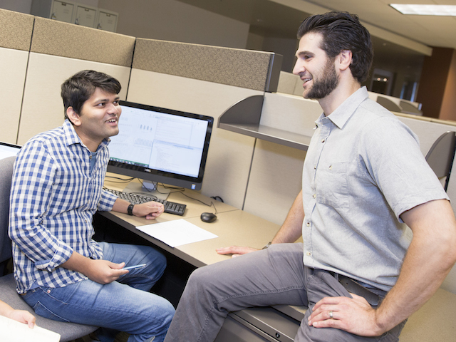 Paulo Shakarian (right) was awarded a grant from the Young Investigator Research Program of the Air Force Office of Scientific Research to figure out what makes information go “viral” on social media – as well as what keeps it from happening. Photo by Jessica Hochreiter / ASU.