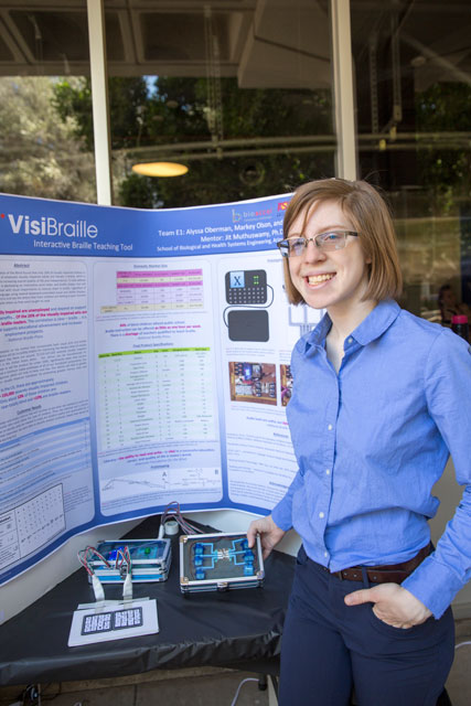 Markey Olson with her project at FURI Symposium