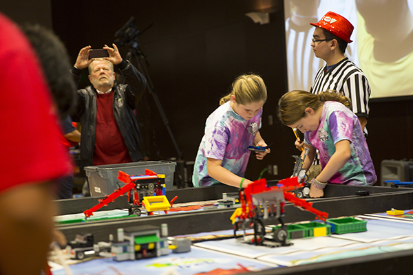 There are moments of high intensity at the Arizona FIRST LEGO League championship tournament, as youngsters concentrate on preparing their robots to perform a variety of technical maneuvers necessary to win points for their teams. Photographer: Jessica Hochreiter/ASU.