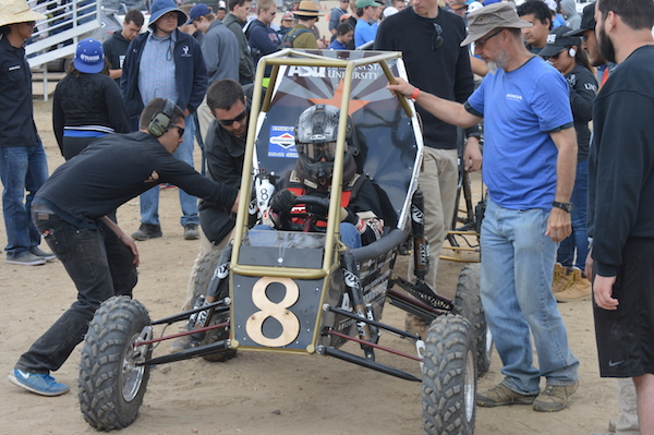ASU Sun Devil Racing Development club members prepare their car for an endurance race at one of the Baja SAE off-road vehicle competitions sponsored by the Society of Automotive Engineers. Photograph courtesy of Sun Devil Racing Development.