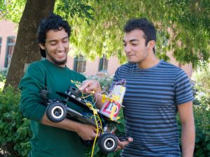 Ridhwaan and Moussa with the Old Main QT Rover.