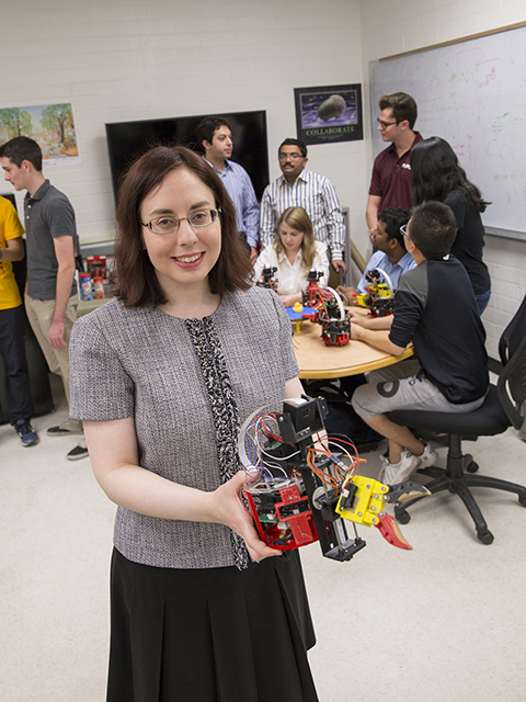 Spring Berman, an assistant professor of mechanical and aerospace engineering, is developing techniques for modeling, optimization and control of very large collectives of individual robots, or robot swarms. Photographer: Jessica Hochreiter/ASU
