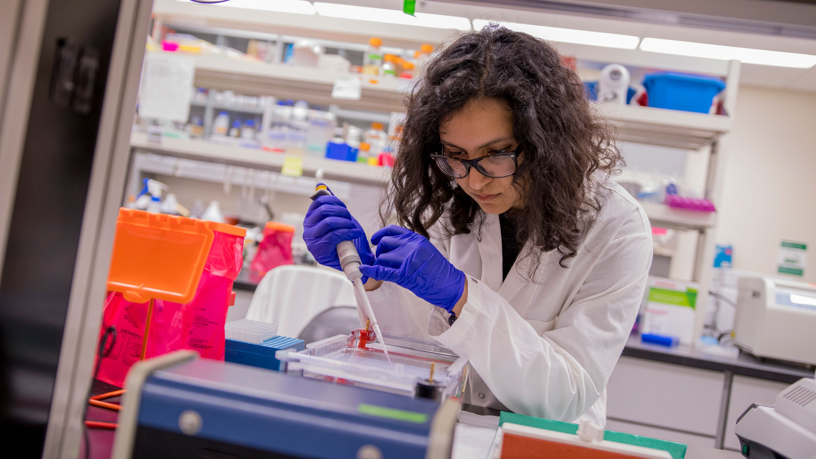 Grand Challenges Scholar Ava Karanjia works on chemical engineering and microbiology research in the lab.